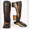 Venum Elite Evo Shinguards Nero-Oro