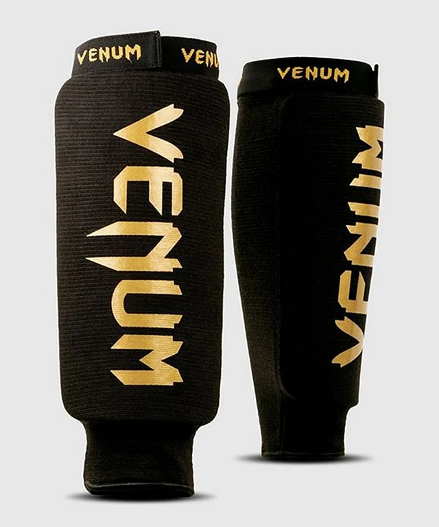 Venum Kontact Shin Guards Simple Nero-Oro 1 Venum Kontact Shin Guards Simple Nero-Oro