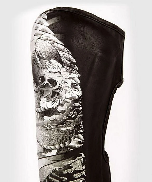 Venum YKZ21 Shinguards Nero-Nero 2 Venum YKZ21 Shinguards Nero-Nero - immagine 2